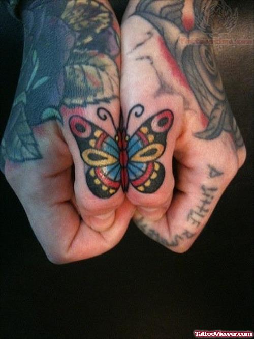 Color Butterfly Tattoo On Thumbs