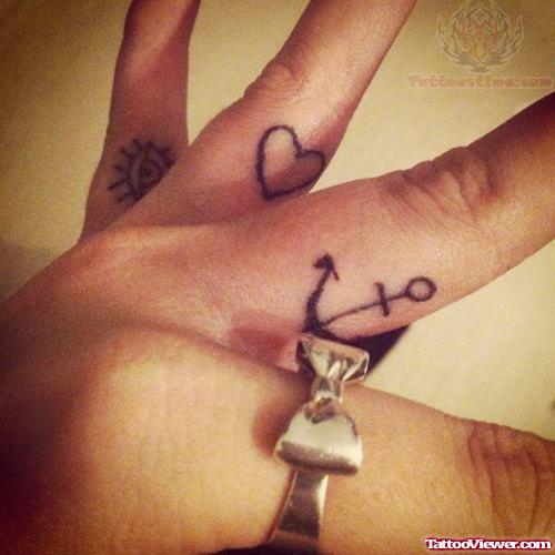 Heart and Anchor Tattoo On Finger Side
