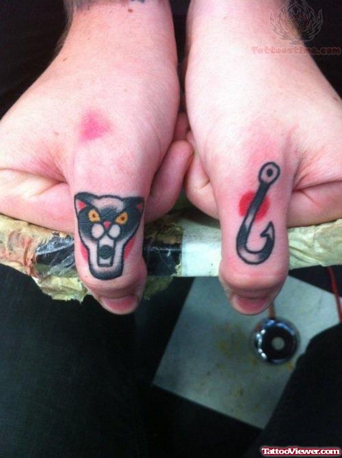 Black Leopard Head Tattoo On Thumb