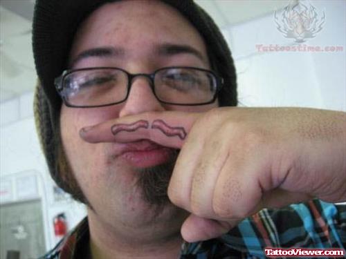 Bacon Mustache Finger Tattoo