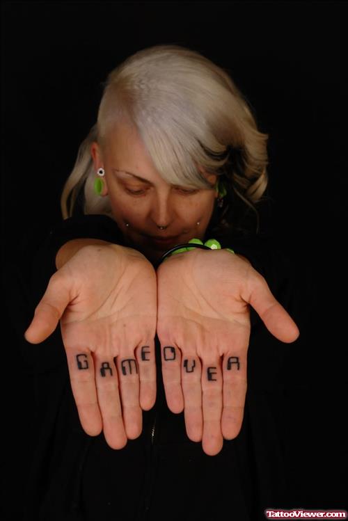 Game Over Tattoo On Fingers