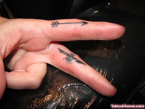 Eagle And Arrow Tattoos On Finger