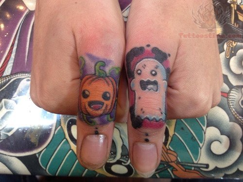 Pumpkin Tattoo On Finger