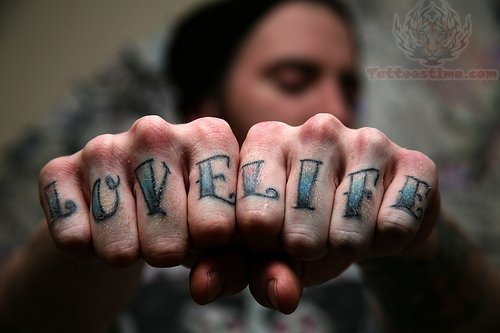 Love Life Tattoo On Girl Fingers
