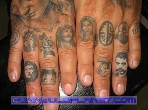 Faces Tattoos On Fingers