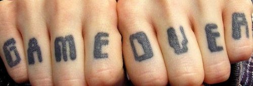 Game Over Finger Tattoos
