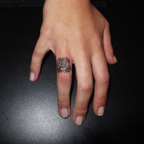 Outline Rose Flower Finger Tattoo