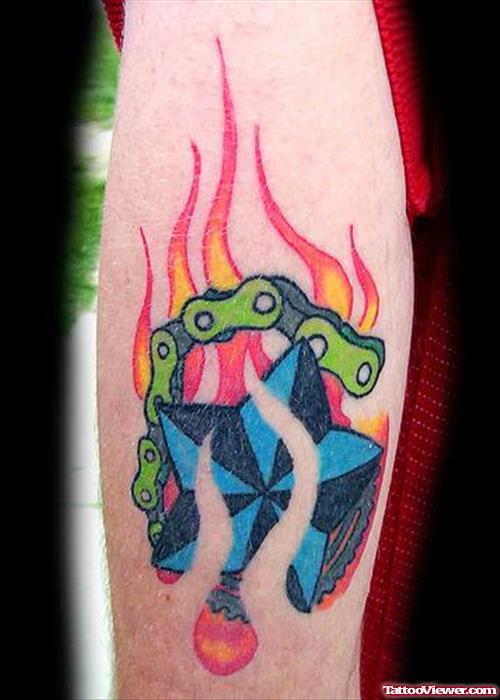 Nautical Star With Fire Flame Tattoo On Arm