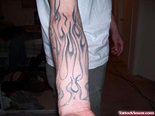 Fire And Flame Tattoo On Right Sleeve