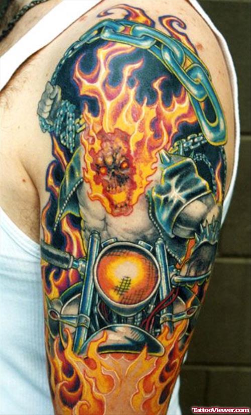 Biker With Fire and Flame Tattoo On Half Sleeve