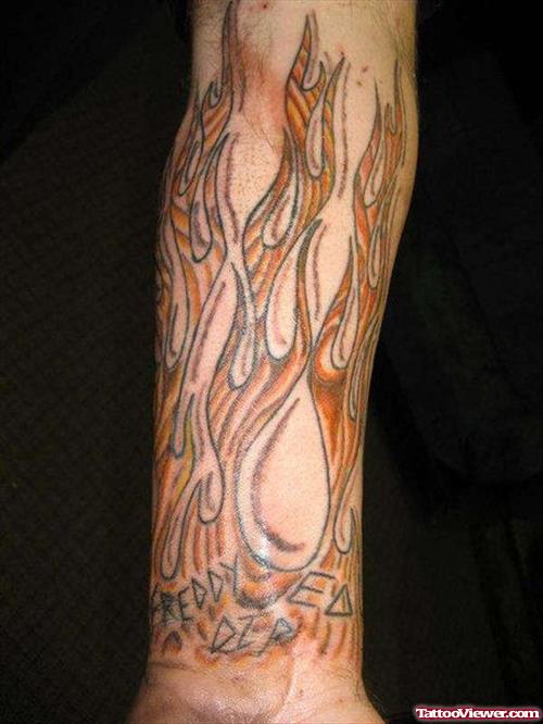 Awesome Grey Ink Fire n Flame Tattoo On Arm