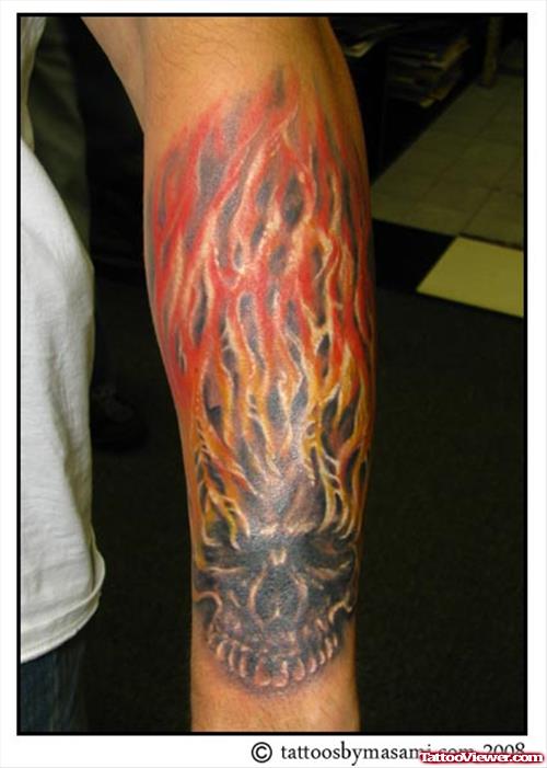 Flaming Skull Tattoo On Left Arm