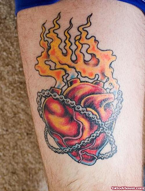 Flaming Heart Tattoo On Thigh