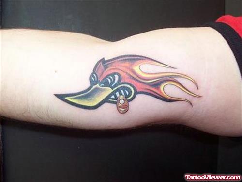 Wood Pecker Head With Flames Tattoo On Bicep