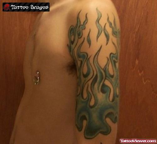 Tribal Fire And Flame Tattoo On Half Sleeve