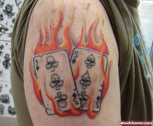 Flaming Cards Tattoo On Shoulder