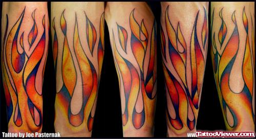 Colored Flames Tattoo On Forearm