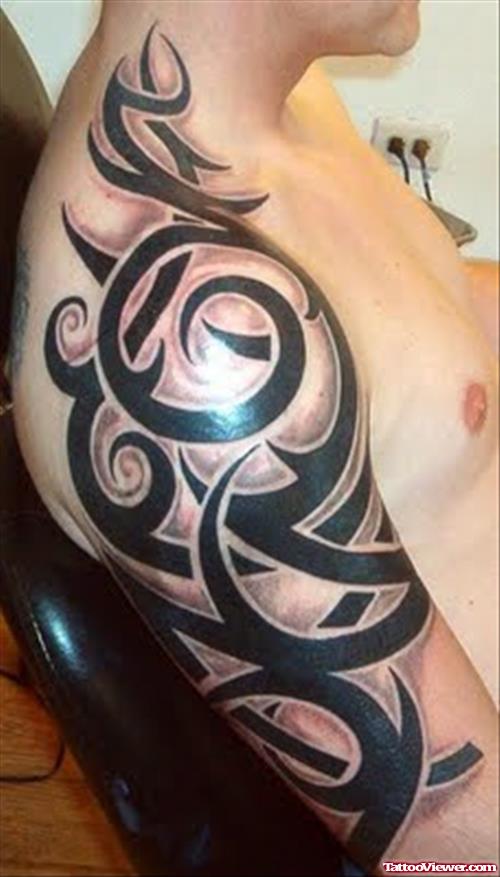 Black Ink Tribal Fire Flame Tattoo On Half Sleeve