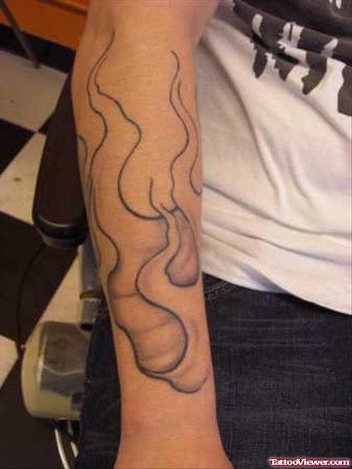 Wonderful Grey Ink Fire n Flame Tattoo On Arm