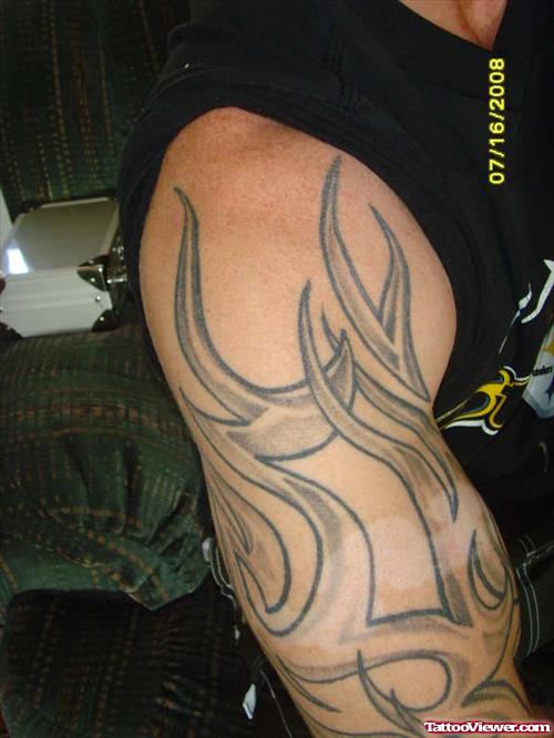 Grey Ink Tribal Fire n Flame Tattoo On Half Sleeve