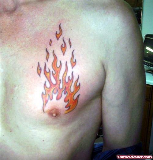 Awesome Colored Fire n Flame Tattoo On Man Chest