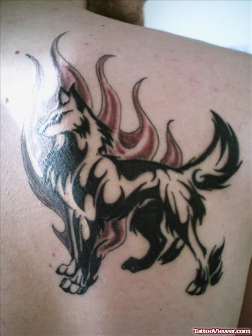 Tribal Wolf Fire And Flame Tattoo On Back Shoulder