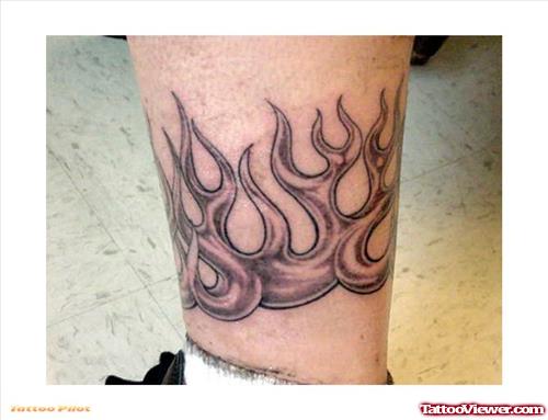 Grey Ink Flames Tattoos On Leg