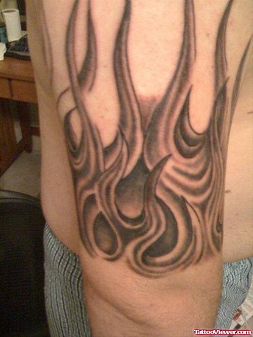 Grey Ink Flames Tattoo On Half Sleeve
