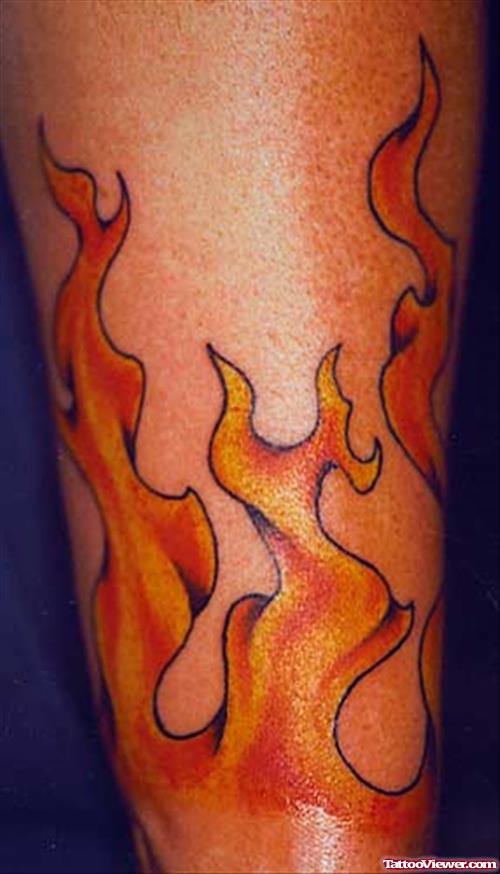 Color Ink Fire And Flame Tattoo On Arm