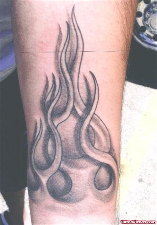 Grey Ink Fire n Flame Tattoo On Arm