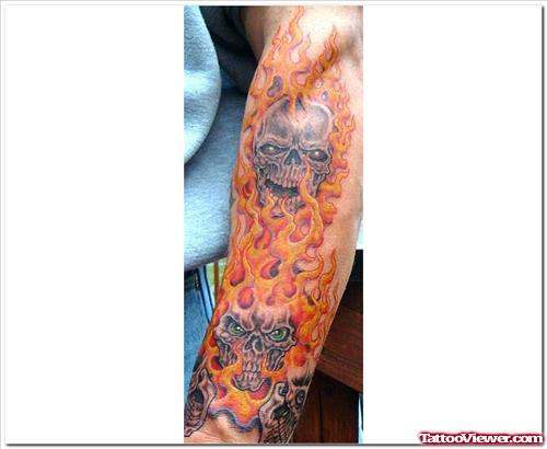 Fire And Flame Skull Tattoo On Left Sleeve