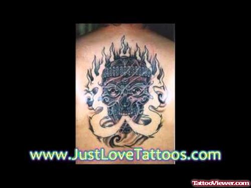 Skull In Fire Flame Tattoo On Upperback