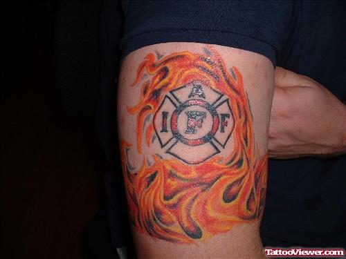 Firefighter Logo In Fire Flames Tattoo