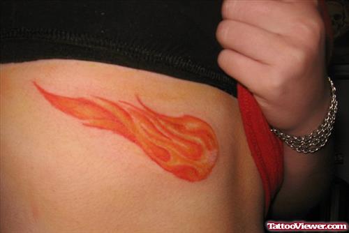 Color Fire and Flame Tattoo On Side Rib