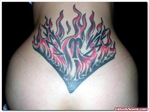 Aries Zodiac Sign In Fire And Flame Tattoo On Lowerback