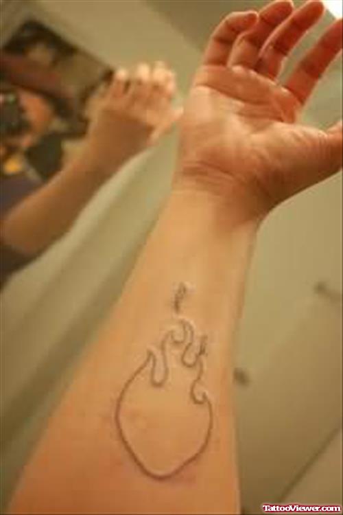 Flame Blacklight Tattoo On Arm
