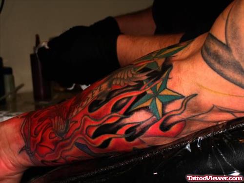 Hot Red Flame Tattoo On Arm