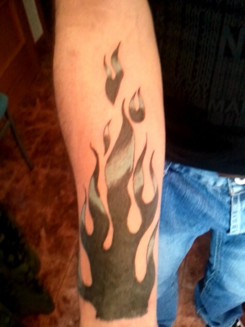 Black Ink Flames Tattoo On Arm
