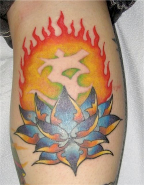 Blue Ink Lotus Flower Fire Flame Tattoo On Leg