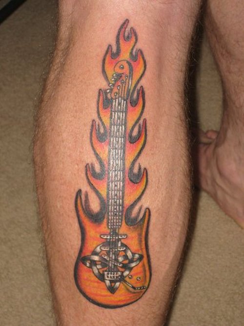 Fire n Flame Guitar Tattoo On Back Leg