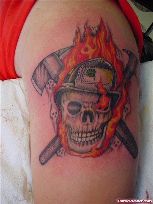 Flaming skull Firefighter Tattoo On Bicep