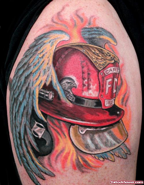 Winged Firefighter Cap Tattoo On Shoulder
