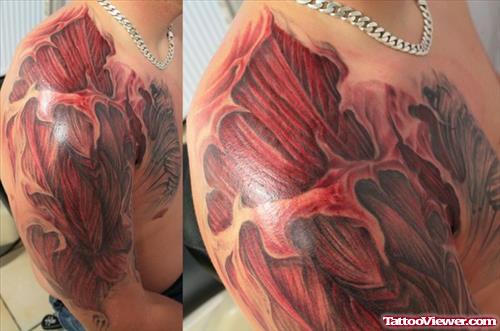 Ripped SKin Firefighter Tattoo On Shoulder