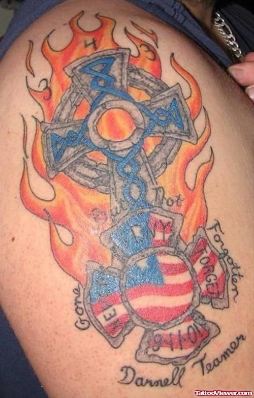 Flaming Cross And Firefighter Tattoo On Shoulder