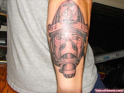 Grey Ink Firefighter Mask Tattoo On Right Arm