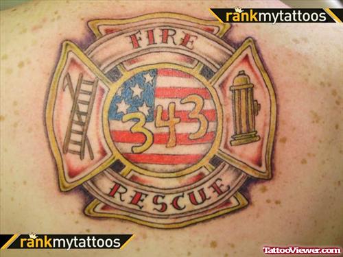 Colored Firefighter Tattoo On Back