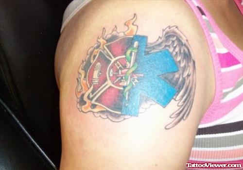 Colored Firefighter Logo Tattoo On Right Shoulder