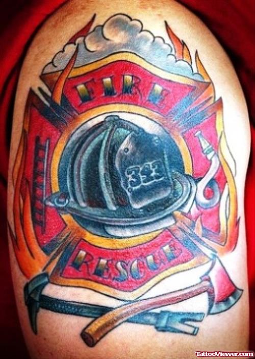 Color Ink Firefighter Tattoo On Shoulder