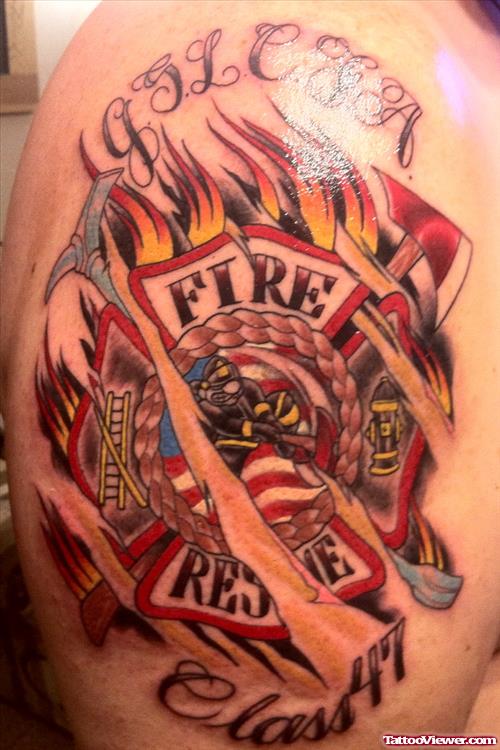 Glowing Firefighter Tattoo On Shoulder