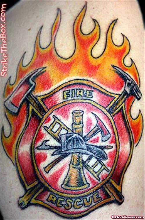 Flaming Firefighter Logo Tattoo On Shoulder